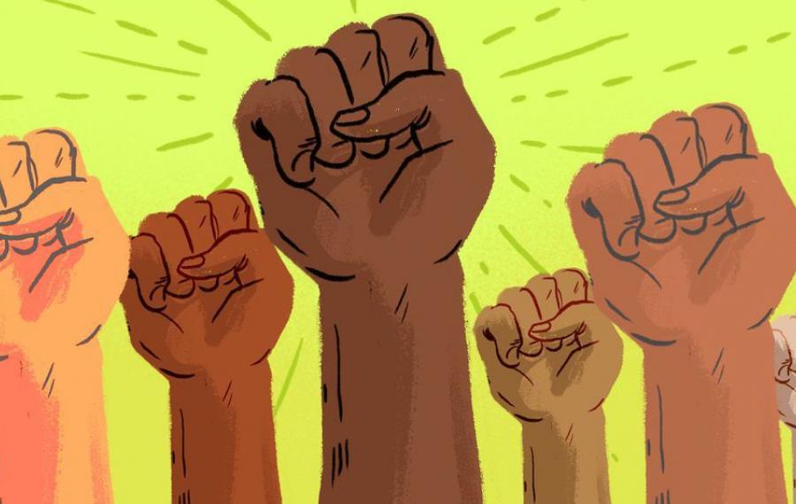 Multiracial fists in the air