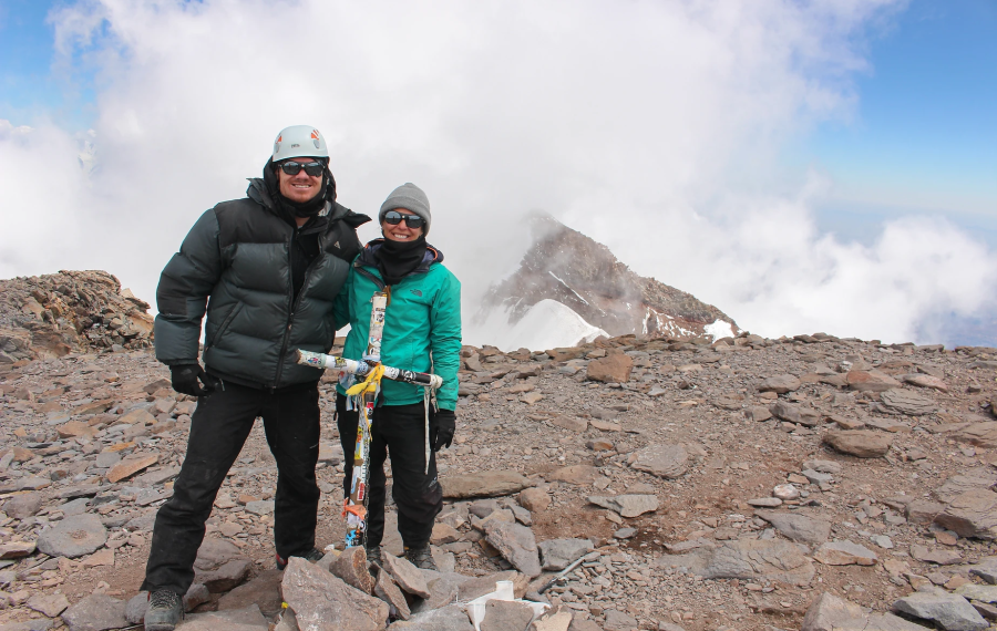 Scott Lehmann and Shayna Unger on a mountain top.