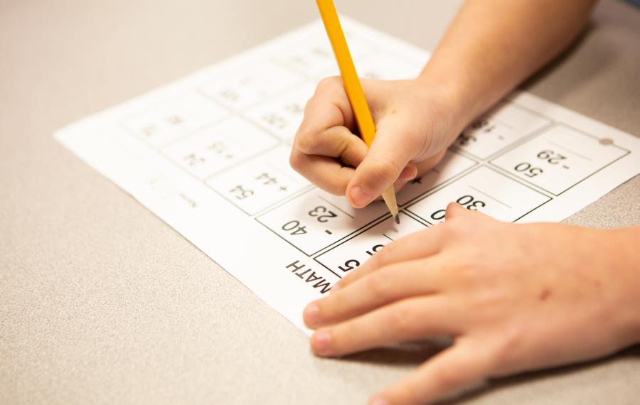 a student doing math assignment 