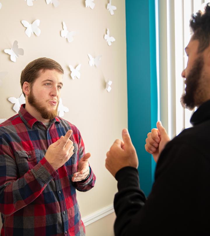 A man talking to another man.