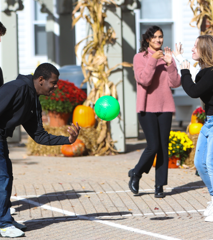 Students playing four square on TLC campus