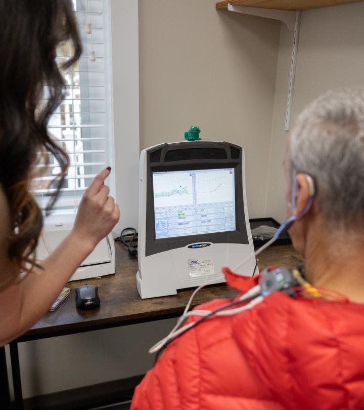 Two people looking at hearing result