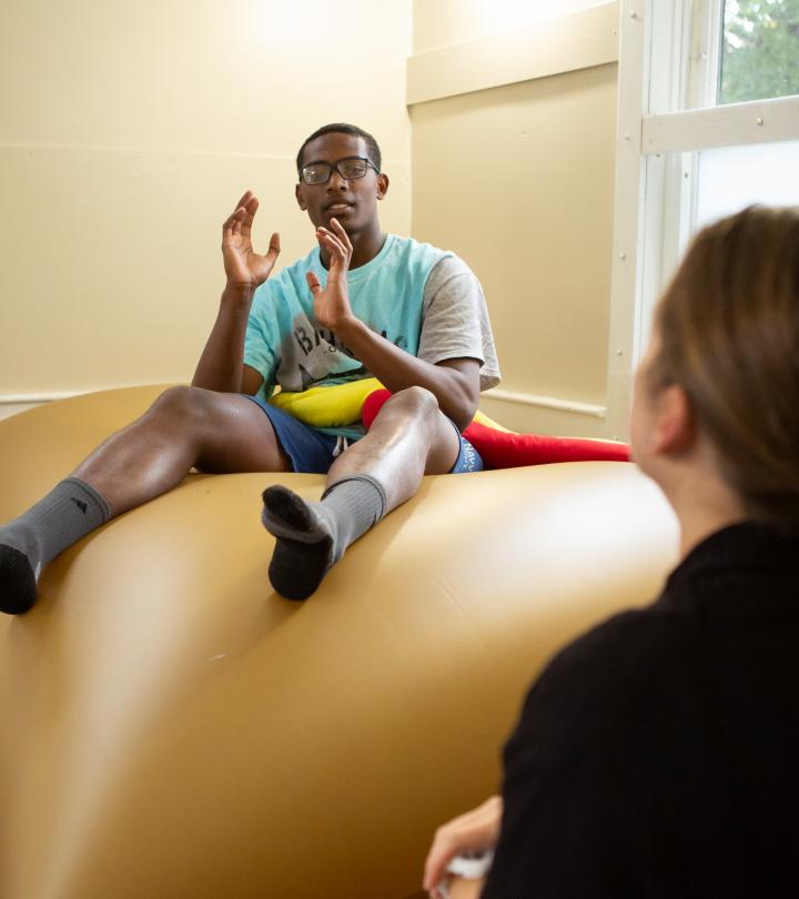 A student talking to teacher