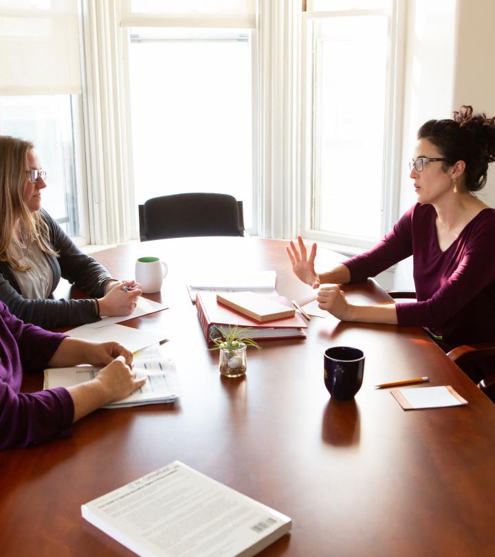 Staff discussing in the meeting.