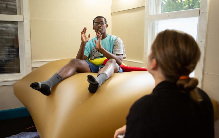 A student talking to teacher