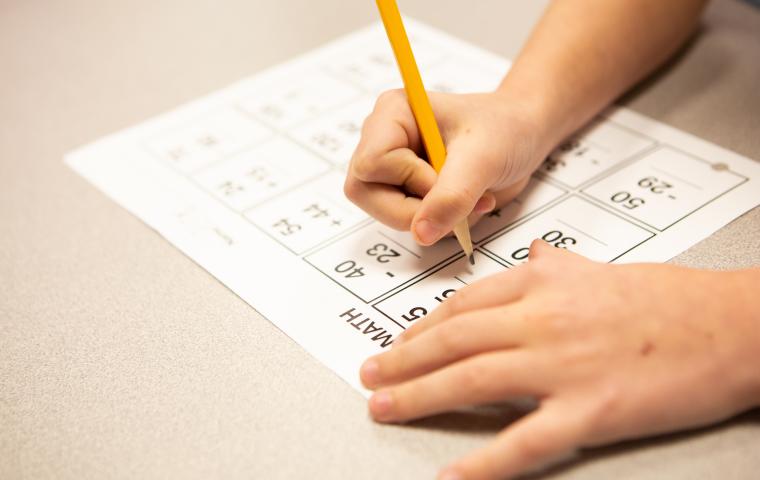 a student doing math assignment