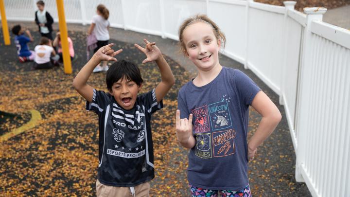 Two elementary students outside