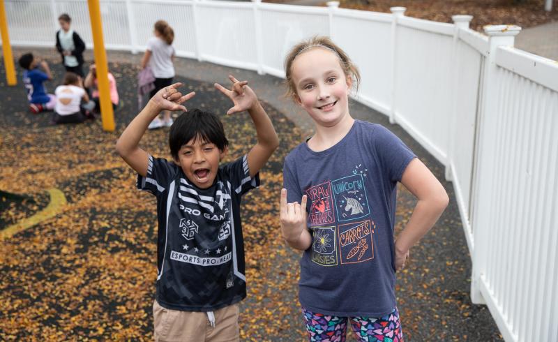 Two elementary students outside