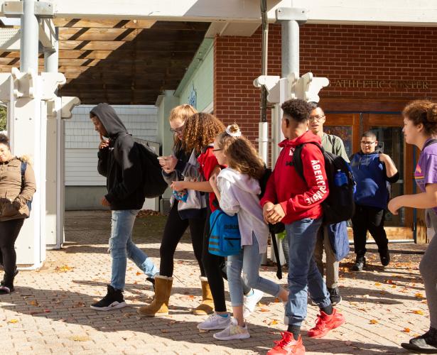 A group of secondary students walking.