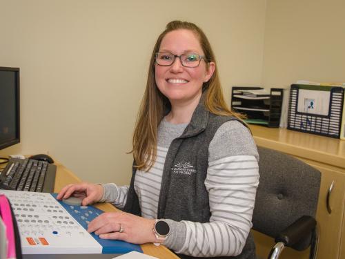 audiologist smiling at the camera