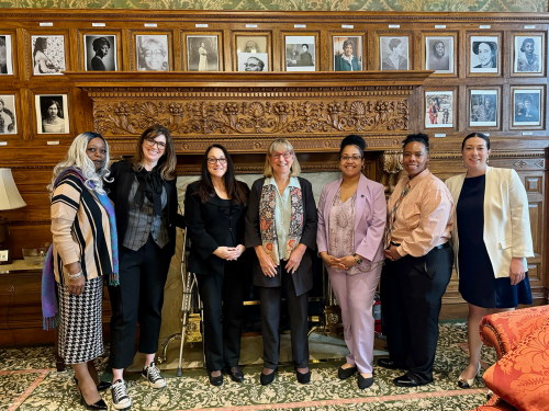 Sarah Glenn-Smith, Senate President Karen Spilka and members of Massachusetts Commission on the Status of Women