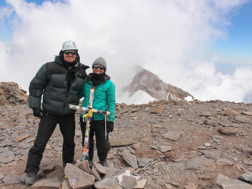 Scott Lehmann and Shayna Unger on a mountain top.